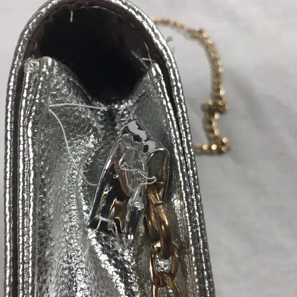 Metallic Silver bag with patches and gold chain